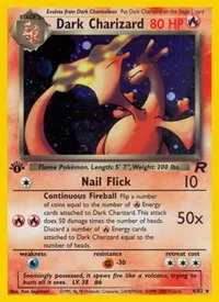 Dark Charizard Pokemon card from the 2000 team rocket set. Looking to the side with ember on his tail.